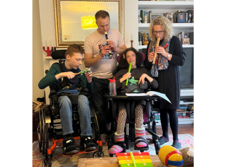 Penny Pallant and family playing recorder.png